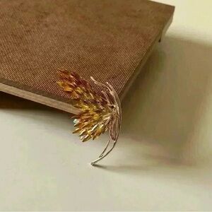 Elegant Gold and Brown Brooch